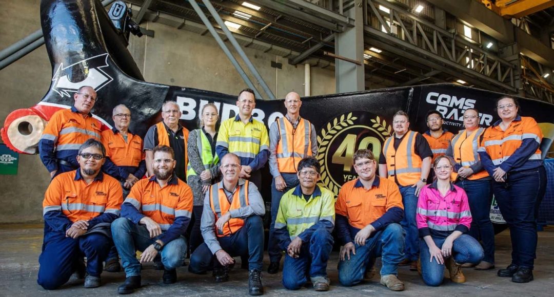 CR Mining team with 40th anniversary bucket
