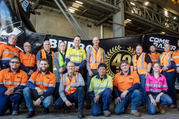 CR Mining team with 40th anniversary bucket